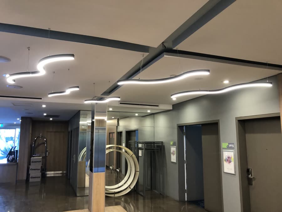 Feature LED pendant lighting installed in a commercial lobby