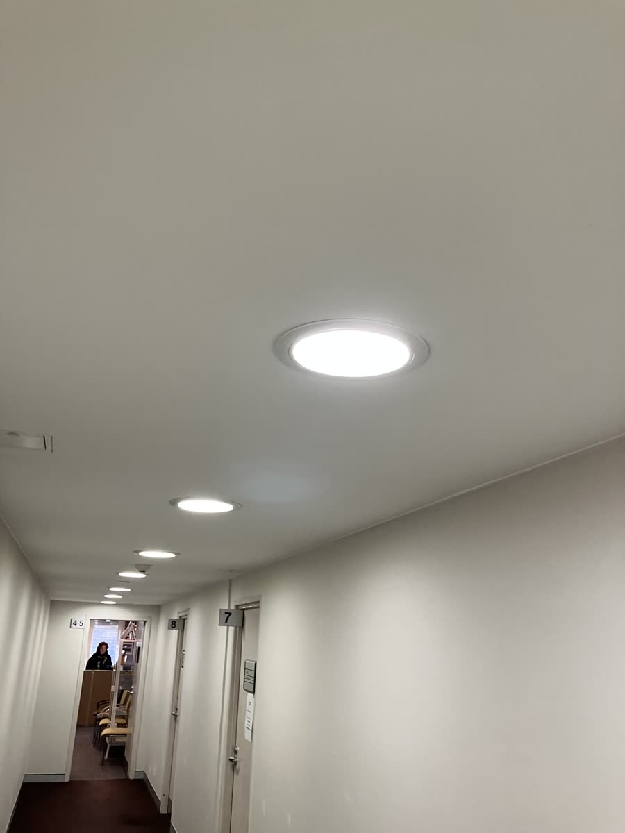 LED downlights installed in a residential hallway